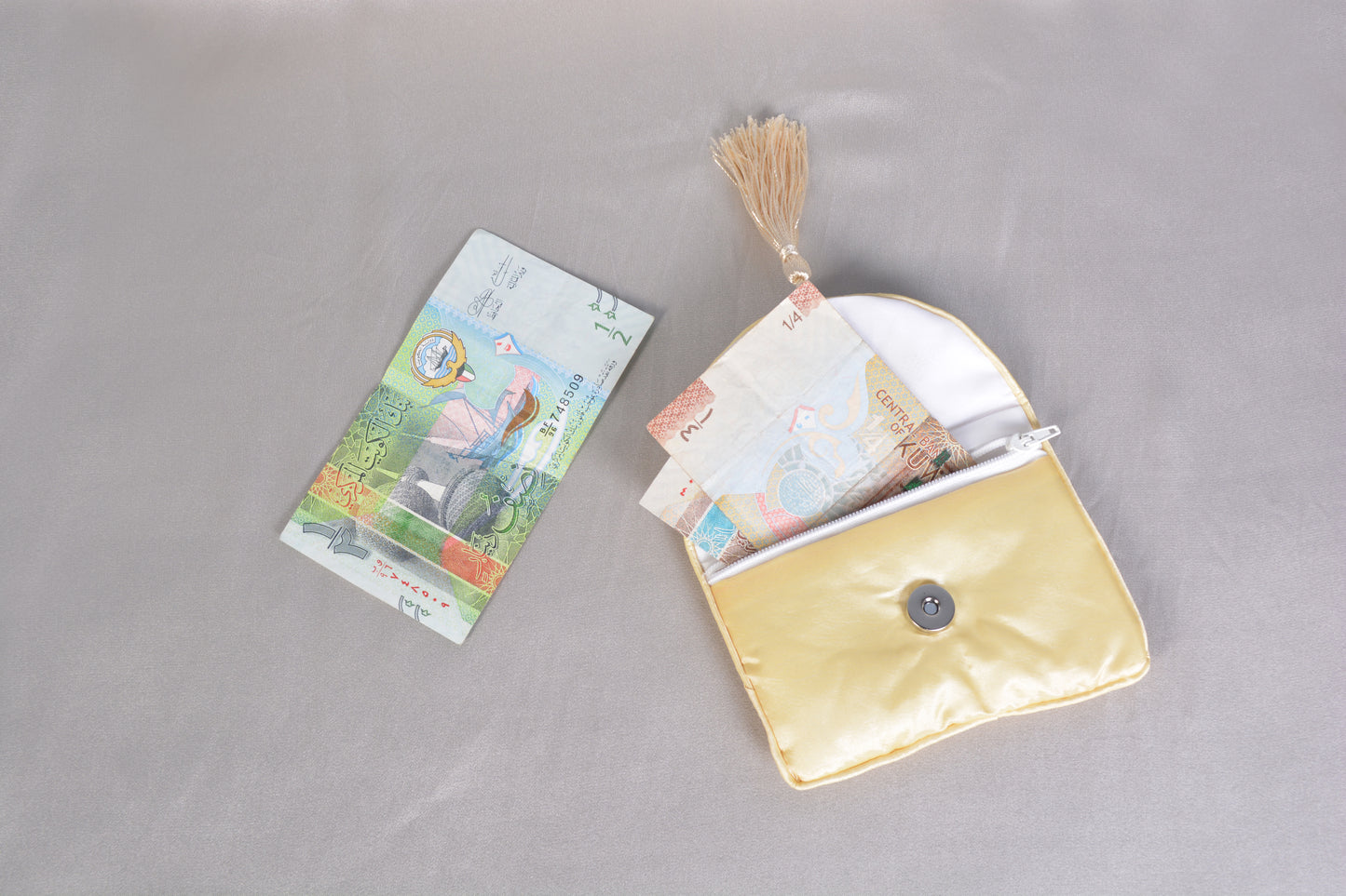 One piece yellow silk traditional Chinese money pouch.