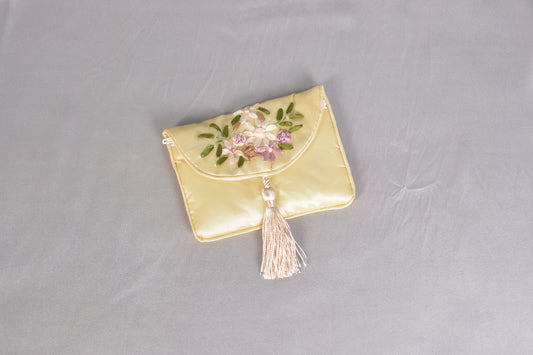 One piece yellow silk traditional Chinese money pouch.